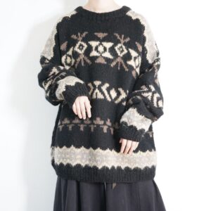 black base nordic motif hand knit