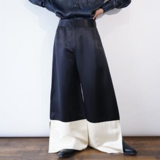 glossy black × beige switching wide pants