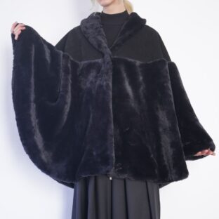 leather × glossy black fur poncho