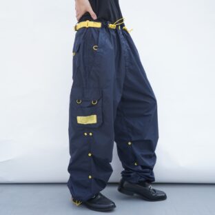 wide silhouette navy × yellow gimmick tech nylon pants