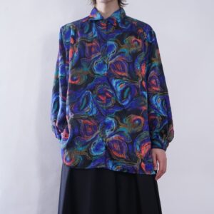 glossy blue pattern on pattern shirt