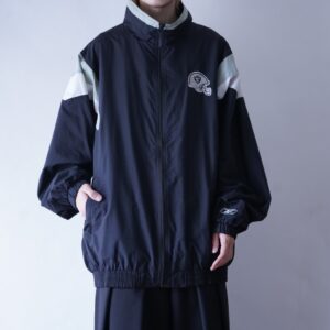 【Reebok】oversized ”RAIDERS” back embroidery nylon jacket