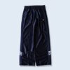 【adidas】glossy black side snap wide track pants