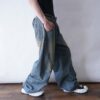 circle silhouette brown fade baggy wide denim pants