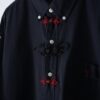 "China × Lace-up" black × red shirt