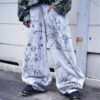 "Wall Paint" ancient motif white baggy remake pants