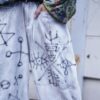 "Wall Paint" ancient motif white baggy remake pants