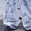 "Wall Paint" ancient motif white baggy remake pants