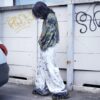 "Wall Paint" ancient motif white baggy remake pants