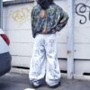 "Wall Paint" ancient motif white baggy remake pants
