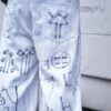 "Wall Paint" ancient motif white baggy remake pants