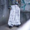 "Wall Paint" ancient motif white baggy remake pants
