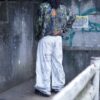 "Wall Paint" ancient motif white baggy remake pants