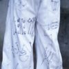 "Wall Paint" ancient motif white baggy remake pants