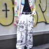 "Wall Paint" prophecy motif white baggy remake pants