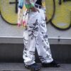 "Wall Paint" prophecy motif white baggy remake pants