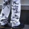 "Wall Paint" prophecy motif white baggy remake pants