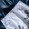 "Wall Paint" prophecy motif white baggy remake pants
