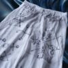 "Wall Paint" ancient motif white baggy remake pants