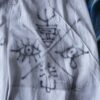 "Wall Paint" ancient motif white baggy remake pants
