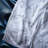 "Wall Paint" ancient motif white baggy remake pants