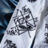 "Wall Paint" prophecy motif white baggy remake pants