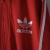 【adidas】 "adidasのトラック生地でフード付き" red hooded track jacket