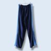 【Nike】"光沢ジャージ生地のコラボレーション" wide track pants