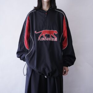 black × red panther motif pullover
