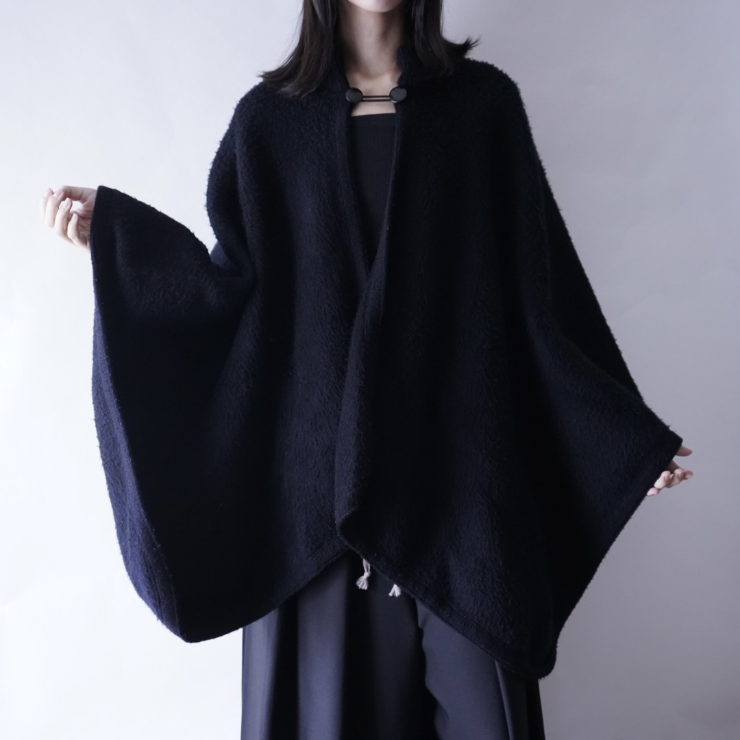 black shaggy wool poncho