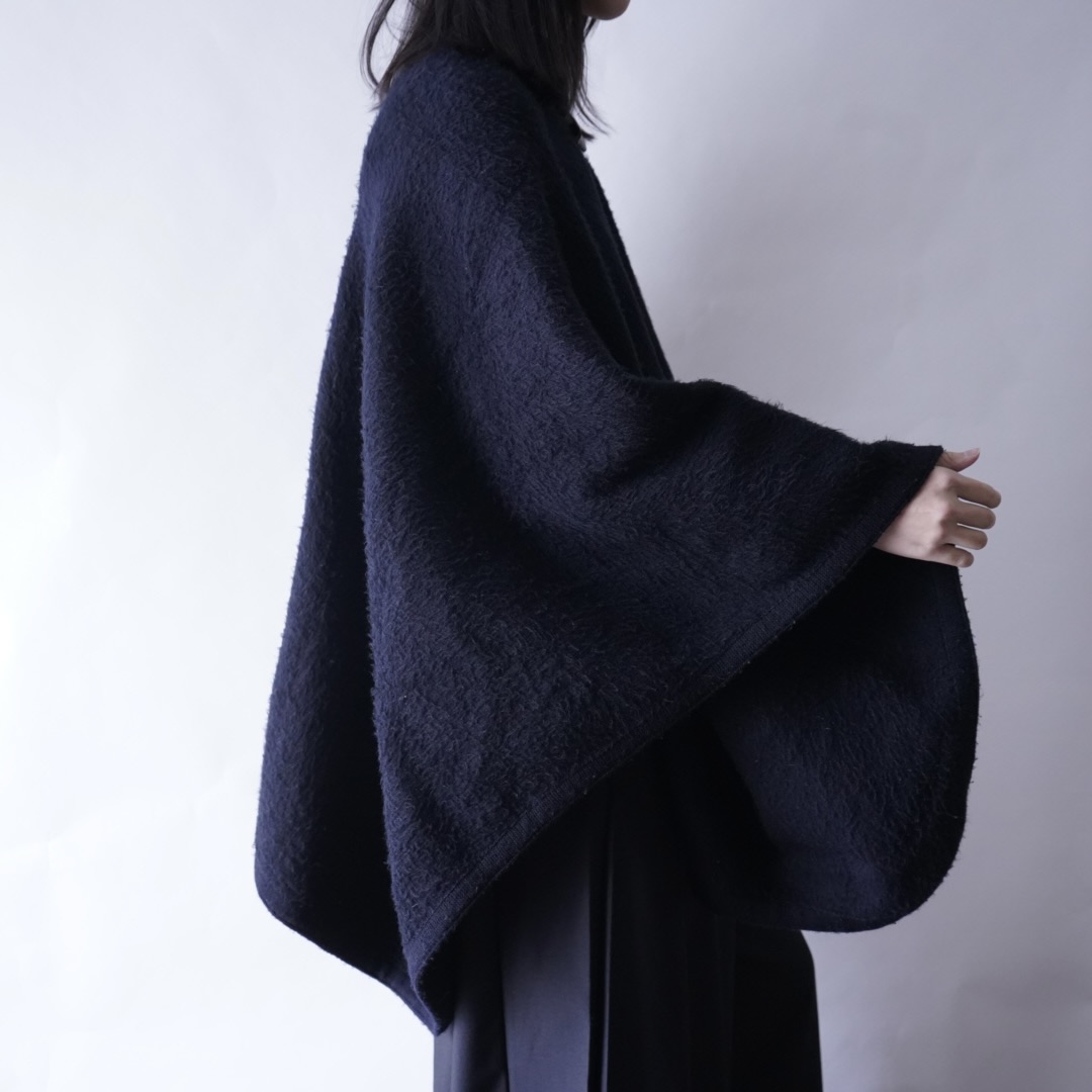 black shaggy wool poncho