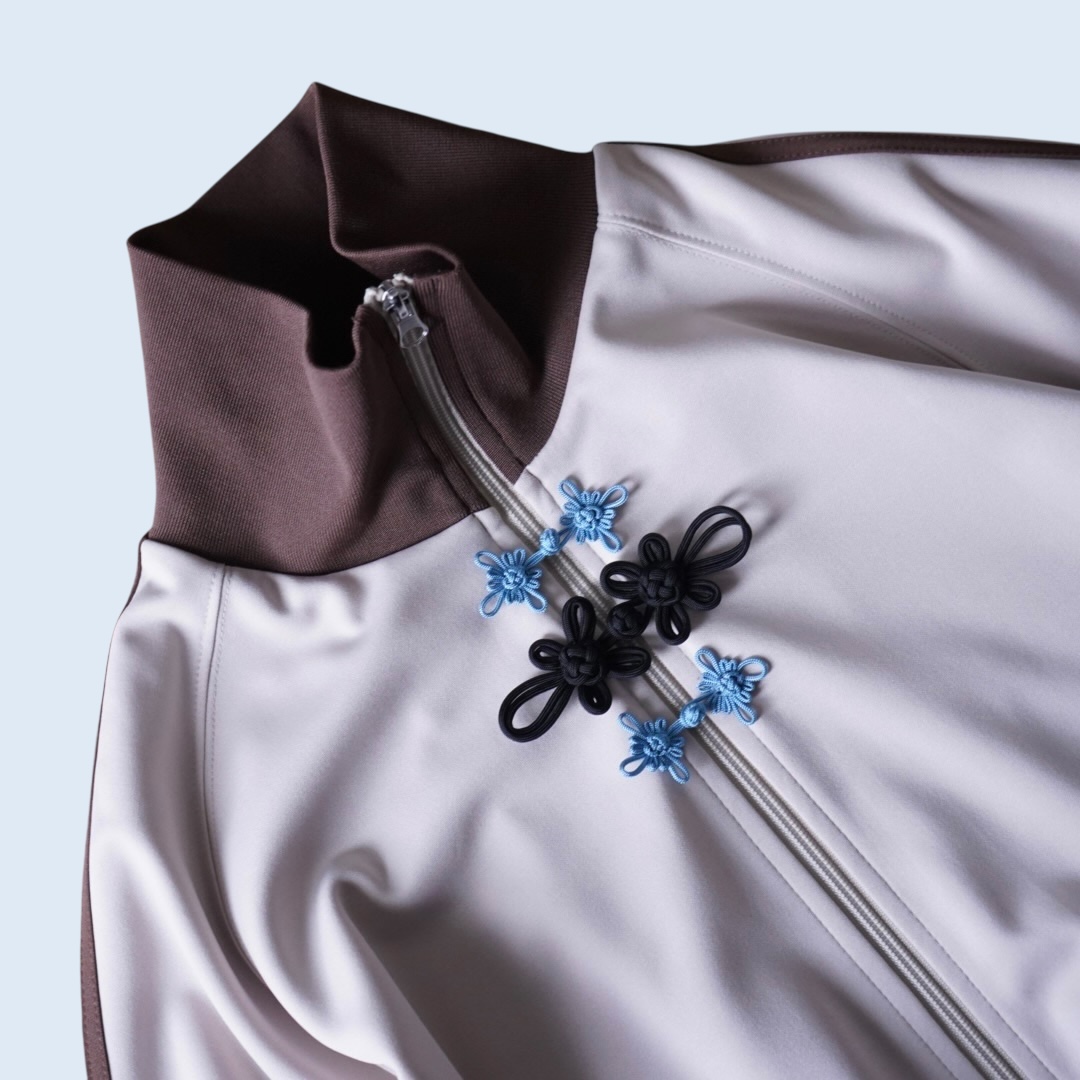 "CHINA × SPORTS" beige × blue China track jacket