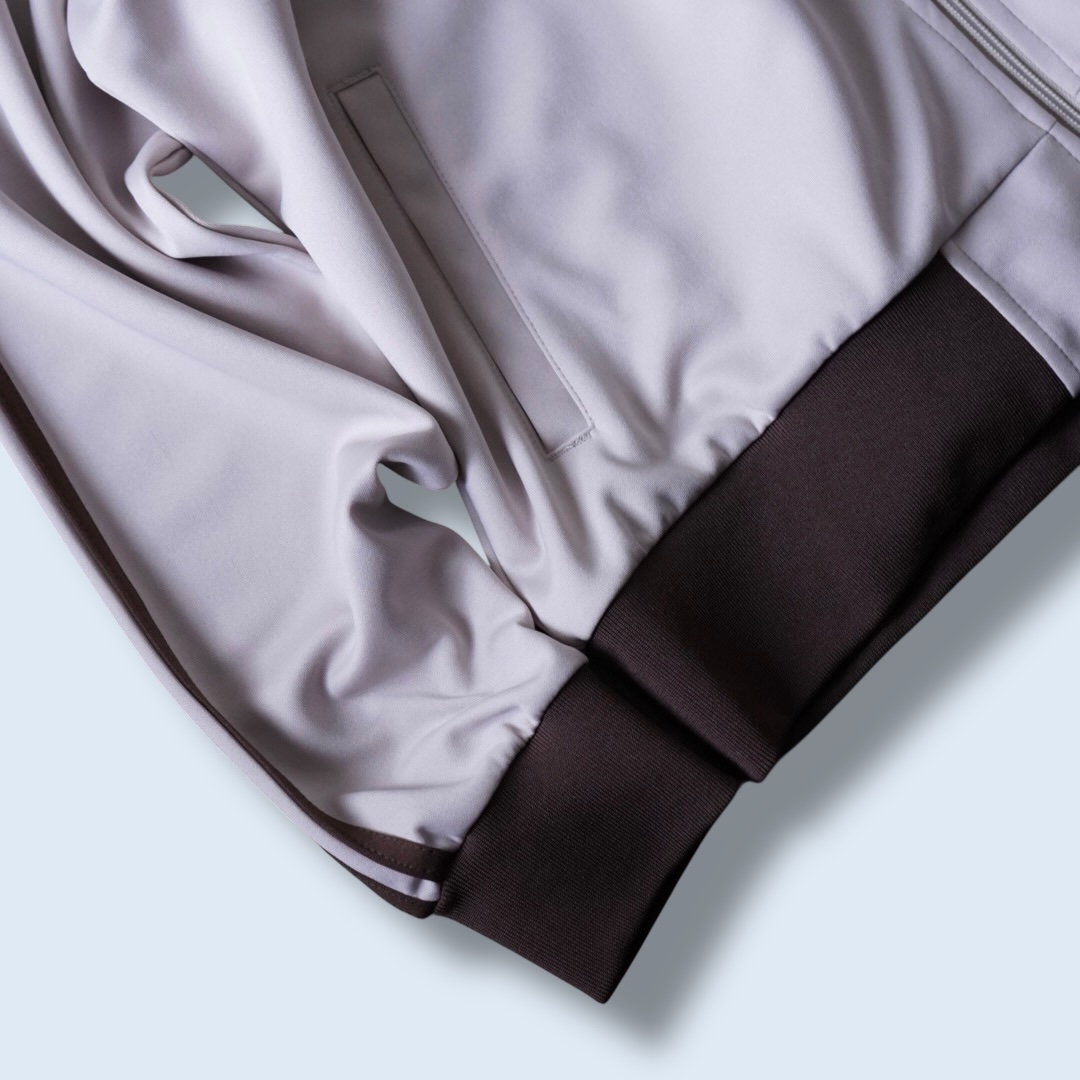 "CHINA × SPORTS" beige × blue China track jacket