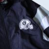 【Reebok】oversized ”RAIDERS” back embroidery nylon jacket