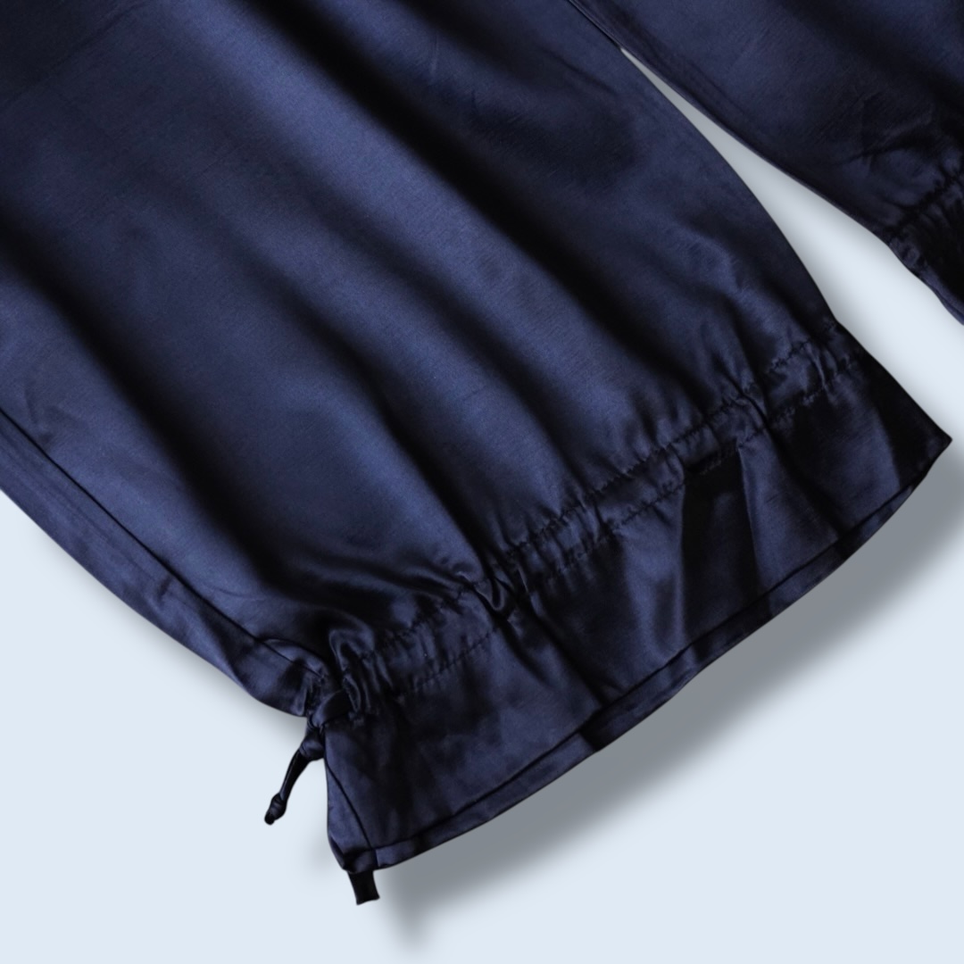 ribbon hem glossy black satin cargo pants