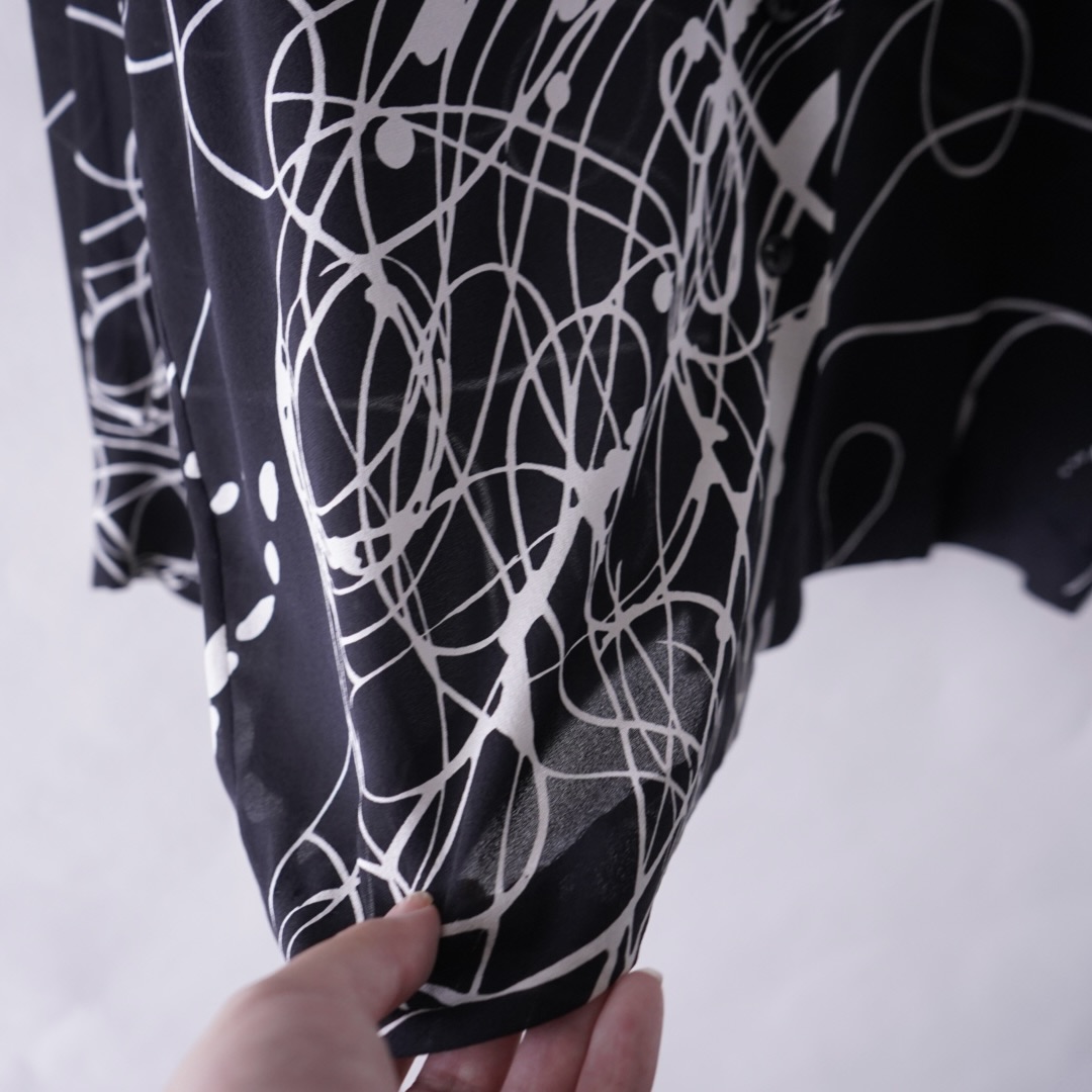 monotone geometric pattern see-through shirt