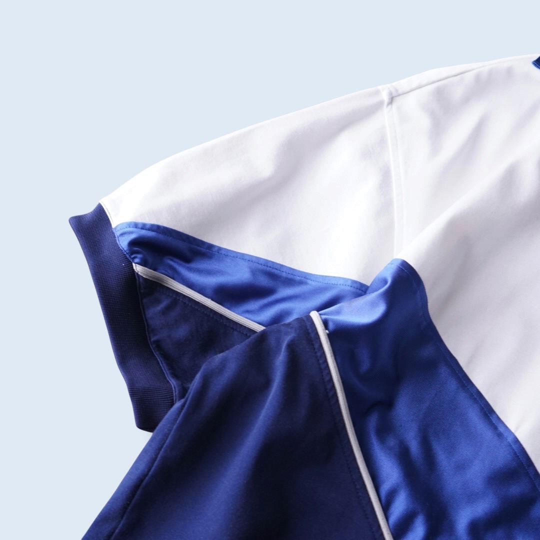 【NIKE】glossy blue × white wappen design game shirt