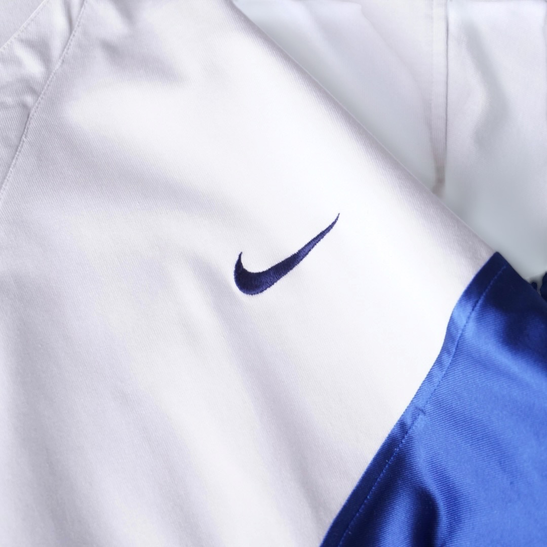 【NIKE】glossy blue × white wappen design game shirt