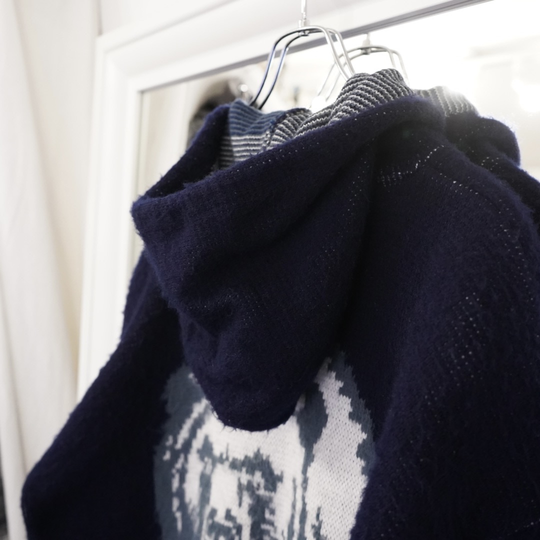 white bear graphic long hair Ecuador knit parka